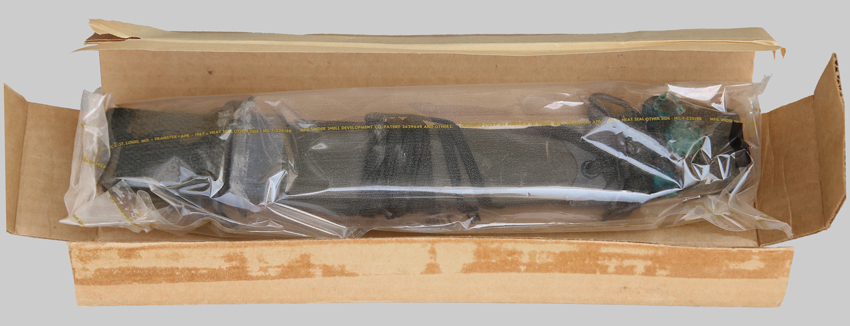 Image of Open Carton of M8A1 Scabbards by the Pennsylvania Working Home for the Blind.