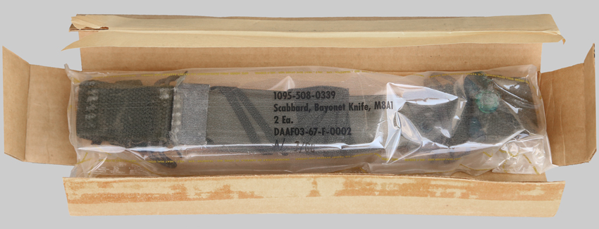 Image of Open Carton of M8A1 Scabbards by the Pennsylvania Working Home for the Blind.