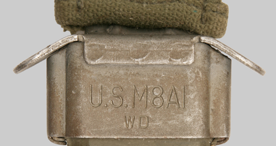 M8A1 scabbard throatpiece with only the WD manufacturer symbol.